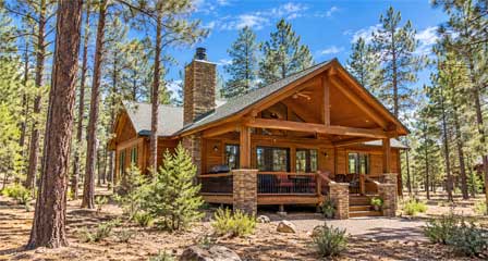 Rustic vacation cabin surrounded by pine forest in Arizona's White Mountains