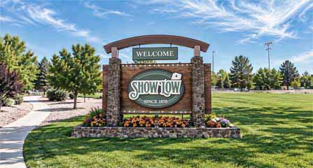 Welcome to Show Low Arizona sign in the scenic White Mountains of eastern Arizona