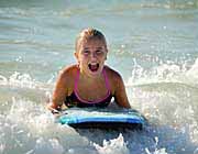 Girl on a surf board in an Arizona Water Park Pool